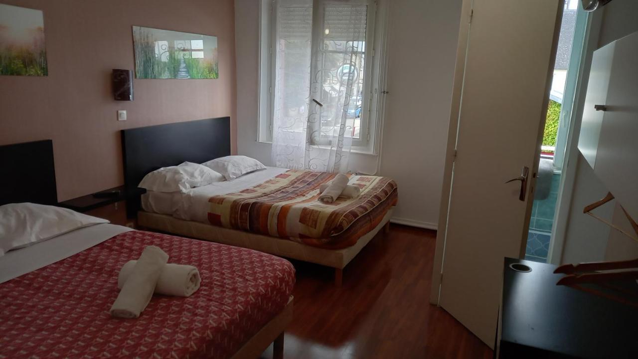 Hotellerie Normande Dozule Bagian luar foto